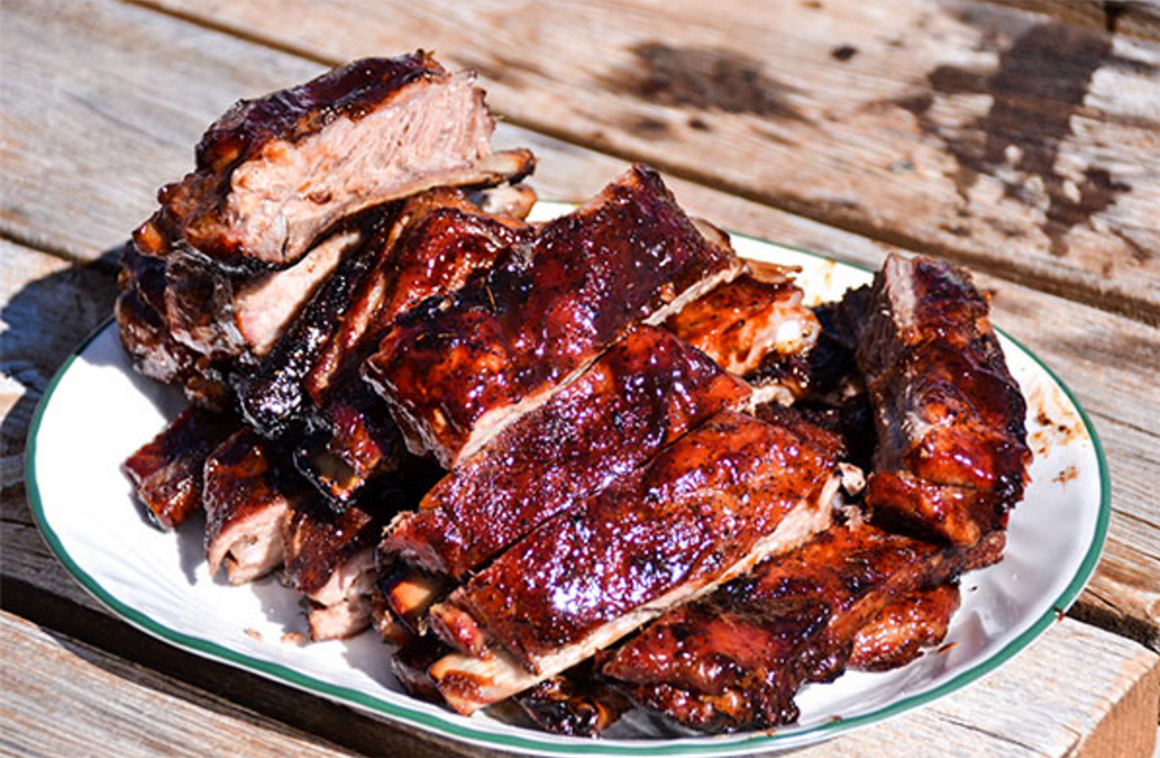 a plate of bbq ribs